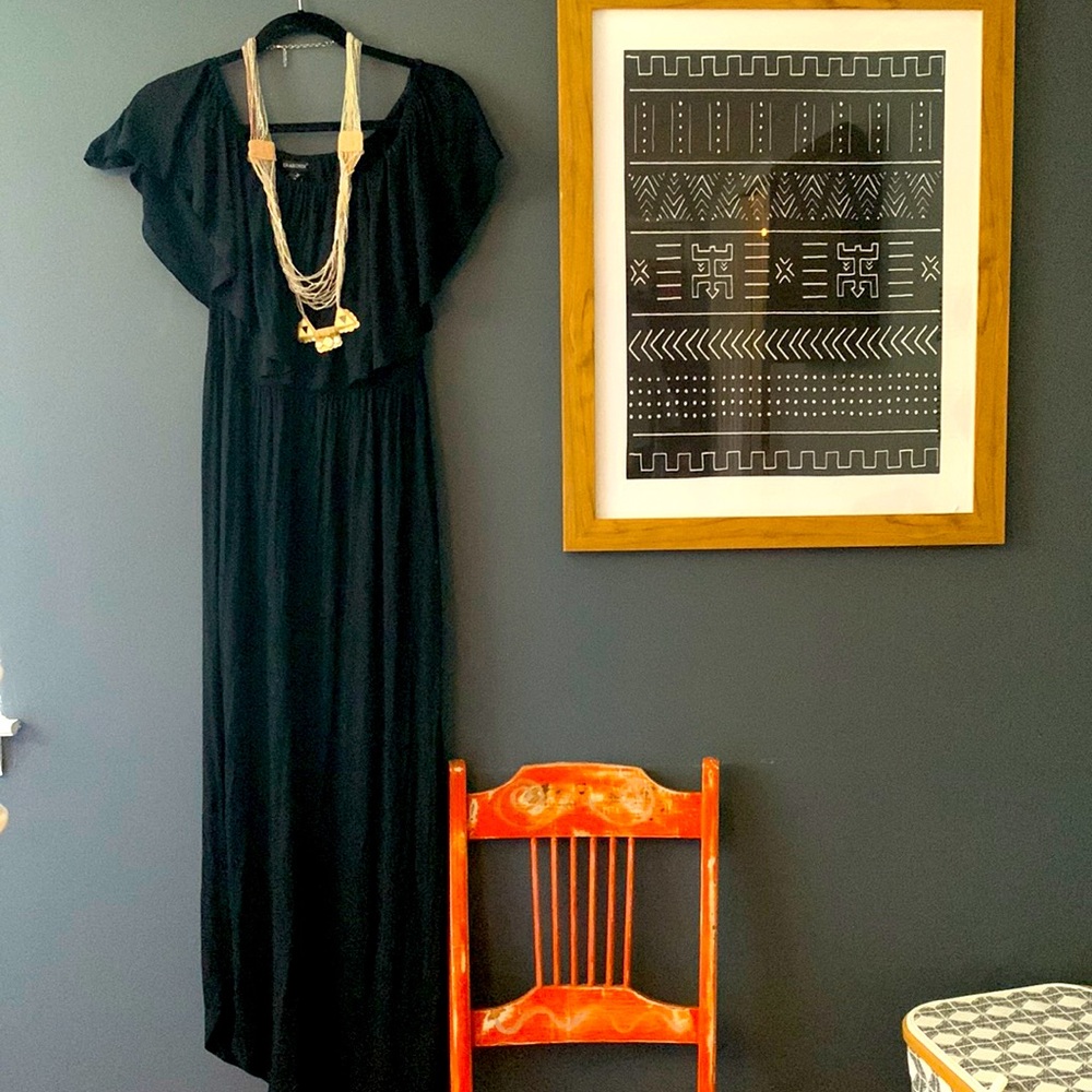 Flattering off or on shoulder pocketed black dress